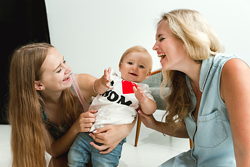 Image showing Young family spending time together and smiling