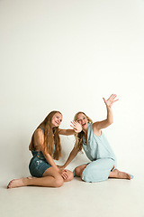 Image showing Mom spending time with her daughter and smiling