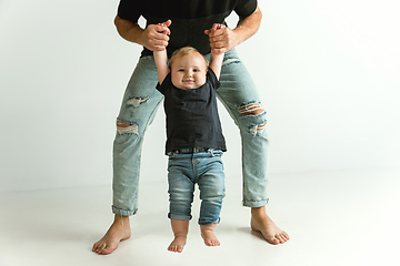 Image showing Happy father holding adorable little son and smiling