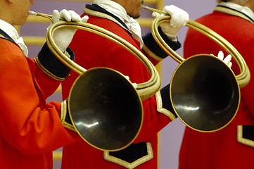 Image showing details of musicians playing on hunting horns