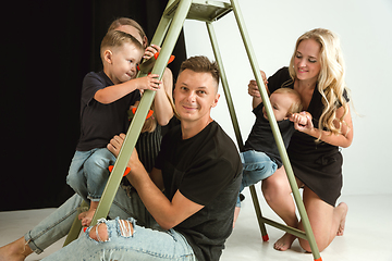 Image showing Young family spending time together and smiling