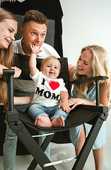 Image showing Young family spending time together and smiling