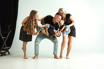 Image showing Young family spending time together and smiling