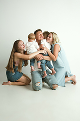 Image showing Young family spending time together and smiling