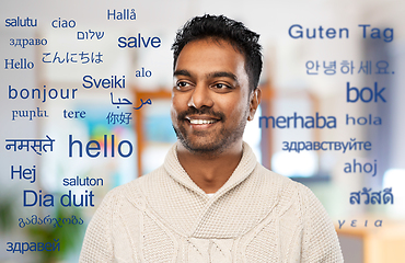 Image showing indian man over words in foreign languages