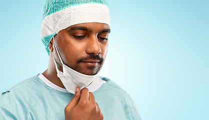 Image showing face of sad doctor or surgeon with protective mask