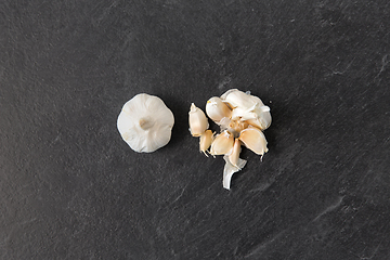 Image showing garlic on slate stone background