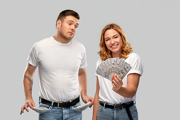 Image showing couple with money and empty pockets