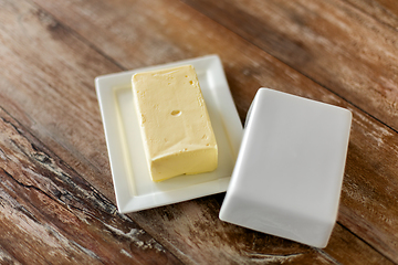 Image showing close up of butter on wooden table