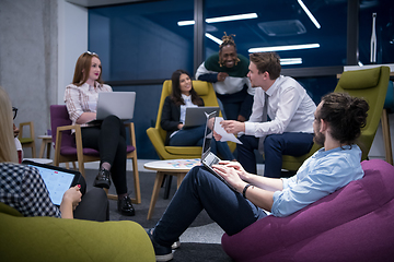 Image showing Multiethnic startup business team having meeting