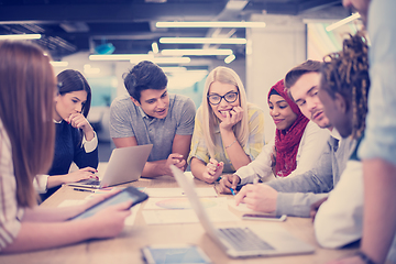 Image showing Multiethnic startup business team having meeting