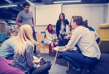 Image showing Multiethnic startup business team having meeting