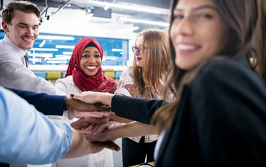 Image showing multiethnic Group of young business people celebrating success