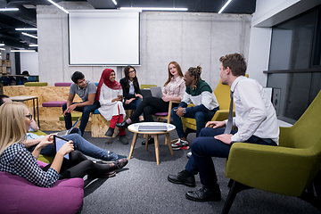 Image showing Multiethnic startup business team having meeting