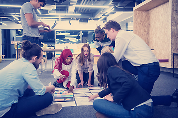 Image showing black muslim woman having meeting with Multiethnic  startup busi