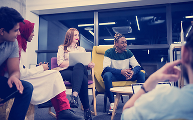 Image showing Multiethnic startup business team having meeting