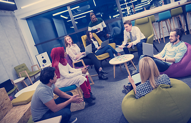 Image showing Multiethnic startup business team having meeting