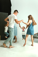 Image showing Young family spending time together and smiling