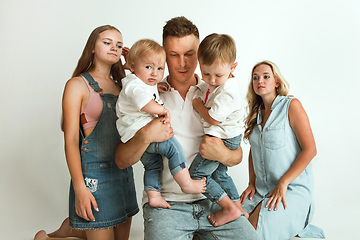 Image showing Young family spending time together and smiling