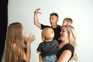 Image showing Young family spending time together and smiling