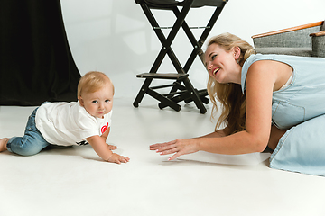 Image showing Young family spending time together and smiling