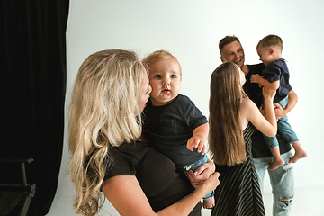 Image showing Young family spending time together and smiling