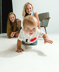 Image showing Young family spending time together and smiling