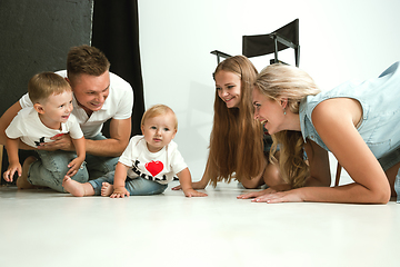 Image showing Young family spending time together and smiling