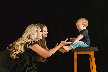 Image showing Young family spending time together and smiling