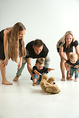 Image showing Young family spending time together and smiling