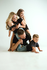 Image showing Young family spending time together and smiling