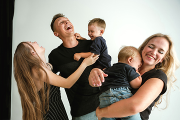 Image showing Young family spending time together and smiling