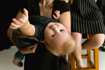 Image showing Young family spending time together and smiling