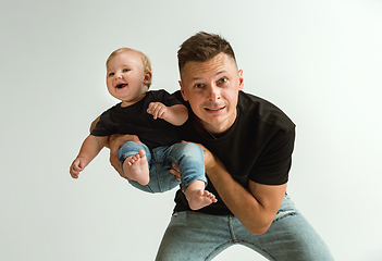 Image showing Happy father holding adorable little son and smiling