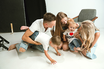 Image showing Young family spending time together and smiling