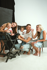 Image showing Young family spending time together and smiling