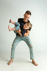 Image showing Happy father holding adorable little son and smiling