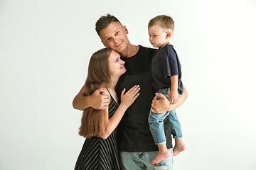 Image showing Young family spending time together and smiling