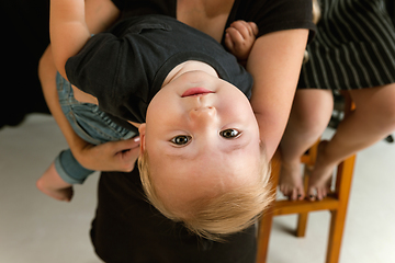 Image showing Young family spending time together and smiling