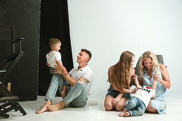 Image showing Young family spending time together and smiling