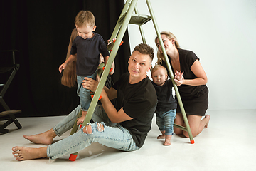 Image showing Young family spending time together and smiling