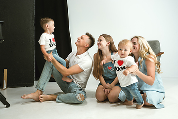 Image showing Young family spending time together and smiling