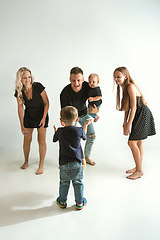 Image showing Young family spending time together and smiling