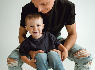 Image showing Happy father holding adorable little son and smiling