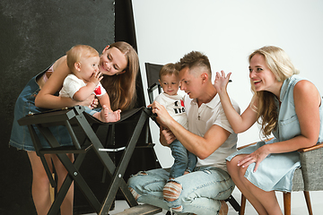 Image showing Young family spending time together and smiling