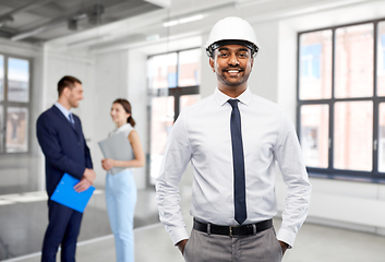 Image showing indian male architect in helmet at office room