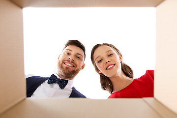 Image showing happy couple looking into open christmas gift box