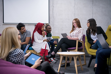 Image showing Multiethnic startup business team having meeting