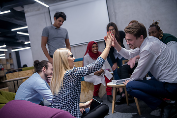 Image showing Multiethnic startup business team having meeting