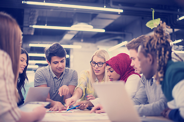 Image showing Multiethnic startup business team having meeting